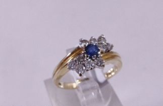 9CT GOLD RING. 9ct gold sapphire and diamond ring, size K/L