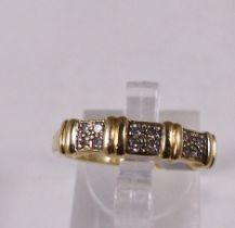 9CT BAND RING. 9ct gold twelve stone diamond band, size P