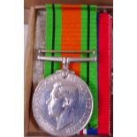 WWII MEDALS. Two WWII medals in box of issue