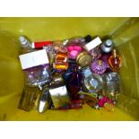 Box of assorted perfume bottles, some part filled