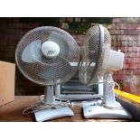 Two electric fans and a heater