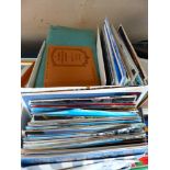 Box of mixed unsorted postcards