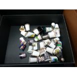 Box of mixed ceramic thimbles