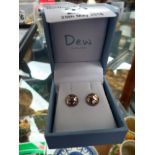 Boxed sterling silver earrings by Dew