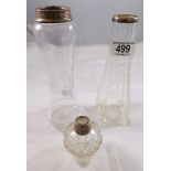 SILVER RIMMED VASES. Two silver rimmed glass vases and perfume bottle (no stopper)