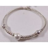 SILVER BRACELET. Sterling silver synthetic pearl stretch bracelet