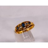 18CT DIAMOND RING. 18ct yellow gold diamond and black stone set ring, size O, 3,1g