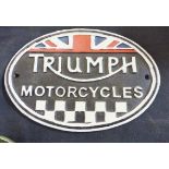 CAST IRON SIGN. Cast iron Triumph sign