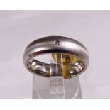 WEDDING RING. Titanium and silver wedding ring with diamond
