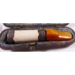 CHEROOT HOLDER. Cased sterling silver and amber cheroot holder, A/F