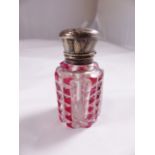 PERFUME BOTTLE WITH STOPPER. Presumed sterling silver topped cut glass perfume bottle with