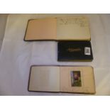 AUTOGRAPH BOOKS. Three antique leather autograph books