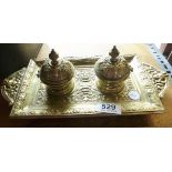 BRASS TWIN INKWELL. Large brass twin inkwell stand with interior ceramic pots in foliate design, L ~