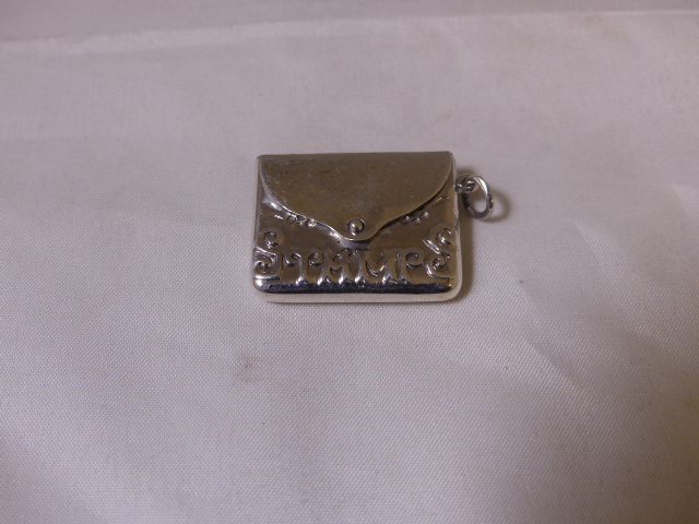 SILVER STAMP CASE. Stamped silver purse stamp case