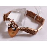 9CT GATE BRACELET. 9ct rose gold gate bracelet with padlock clasp, 18,2g