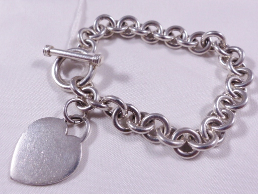 SILVER LINK BRACELET. Sterling silver solid round link bracelet