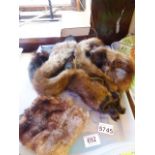 MINK FUR STOLE. Triple mink fur stole and a mink muff