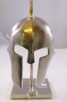 MODEL SPARTAN HELMET. Model of a white metal spartan style helmet