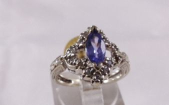 14CT DIAMOND TANZANITE RING. 14ct white gold diamond and marquise cut tanzanite 0,75ct ring