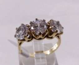 9CT THREE STONE RING. 9ct gold large three stone ring, size N