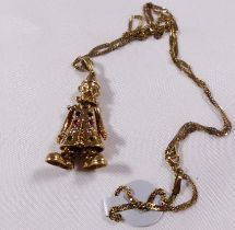 9CT ARTICULATED CLOWN PENDANT. 9ct gold stone set articulated clown pendant on 9ct gold chain, L ~