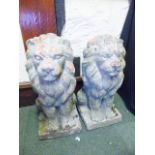 STONE LION GARDEN FIGURES. Pair of cast stone lion garden figures, H ~ 55cm