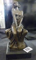 BRONZE LADY. Bronze lady sitting on a tree ~ signed