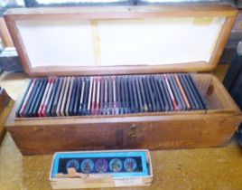 MAGIC LANTERN SLIDES. Two boxes of antique magic lantern slides including Royal Geographical and