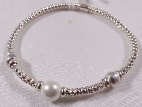 SILVER BRACELET. Sterling silver synthetic pearl stretch bracelet