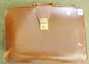 VINTAGE LEATHER BRIEFCASE. Vintage leather briefcase
