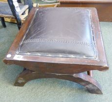 FOOTSTOOL. Stained oak and leather upholstered footstool