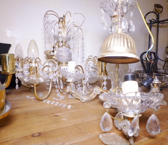 BRASS CHANDELIERS. Two brass and crystal drop chandeliers