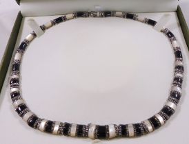 SILVER NECKLACE SET. Silver necklace set with black onyx, mother of pearl and marcasite