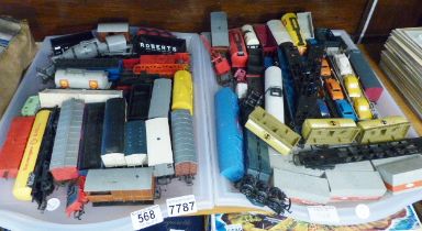 TRAYS OF 00 GUAGE. Two trays of 00 guage coaches and rolling stock including Triang