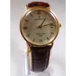 9CT SOVEREIGN WRISTWATCH. Gents 9ct gold Sovereign wristwatch with silver dial and leather strap