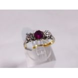 18CT RUBY AND DIAMOND RING. 18ct gold vintage ruby and diamond ring, size L/M