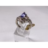 14CT DIAMOND TANZANITE RING. 14ct white gold diamond and marquise cut tanzanite 0,75ct ring