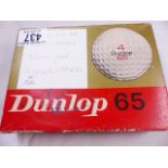 GOLF BALLS. Three wrapped unused Dunlop 65 golf balls and original box