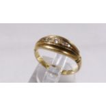 18CT GOLD RING. 18ct gold five diamond ring, size M