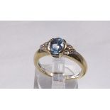 9CT TOPAZ AND DIAMOND RING. 9ct gold topaz and diamond ring, size O
