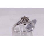 9CT DIAMOND SOLITAIRE. 9ct white gold 0,33ct diamond solitaire ring, size J/K