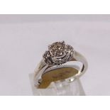 9CT DIAMOND CLUSTER RING. 9ct gold diamond cluster ring, size J