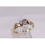 9CT RING SET. 9ct gold ring set with two brilliant cut diamonds, 0,2ct, size N