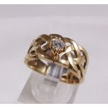 9CT CELTIC RING. 9ct gold gents diamond set Celtic ring, 0,15ct, size N