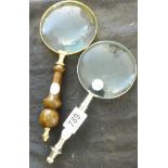 MAGNIFYING GLASSES. Wooden handled magnifying glass and stainless steel handled magnifying glass,