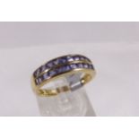 9CT ETERNITY RING. 9ct gold square amethyst set half eternity ring, size O