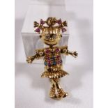 9CT ARTICULATED DOLL. 9ct gold articulated stone set girl pendant