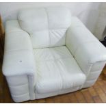 LEATHER CHAIR. Large ivory coloured leather lounge chair