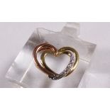 9CT PENDANT. 9ct yellow and rose gold diamond set heart pendant