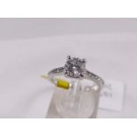 18CT SOLITAIRE. 18ct white gold diamond solitaire ring with diamond set mount, 1.00ct tcn, 0.75ct